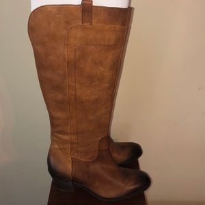 Tan/brown knee high boots.